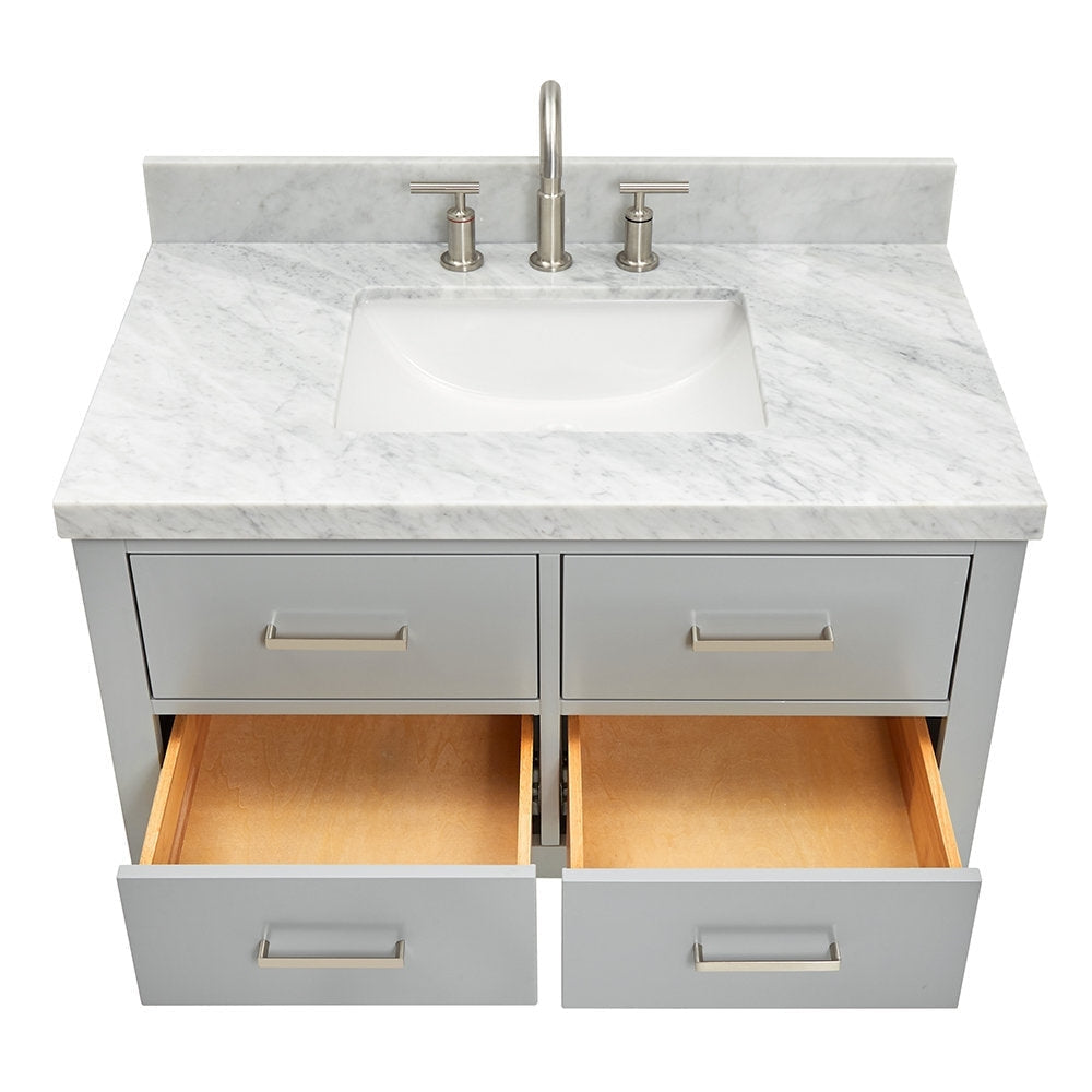 Modern 37-inch solid wood bathroom vanity in stone gray with a marble stone countertop and integrated white ceramic sink, brushed-nickel faucet and pulls; two lower drawers open showing natural wood interiors.
