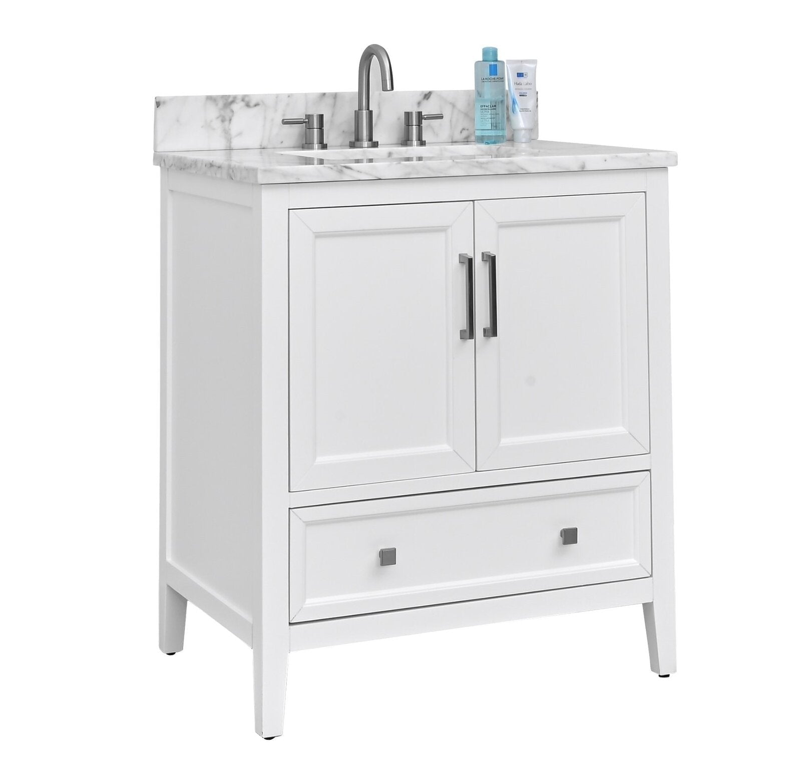 Modern white solid-wood bathroom vanity with a marble-look stone top, integrated rectangular sink, brushed nickel faucet and handles, two cabinet doors and a single lower drawer in a freestanding single-sink design.