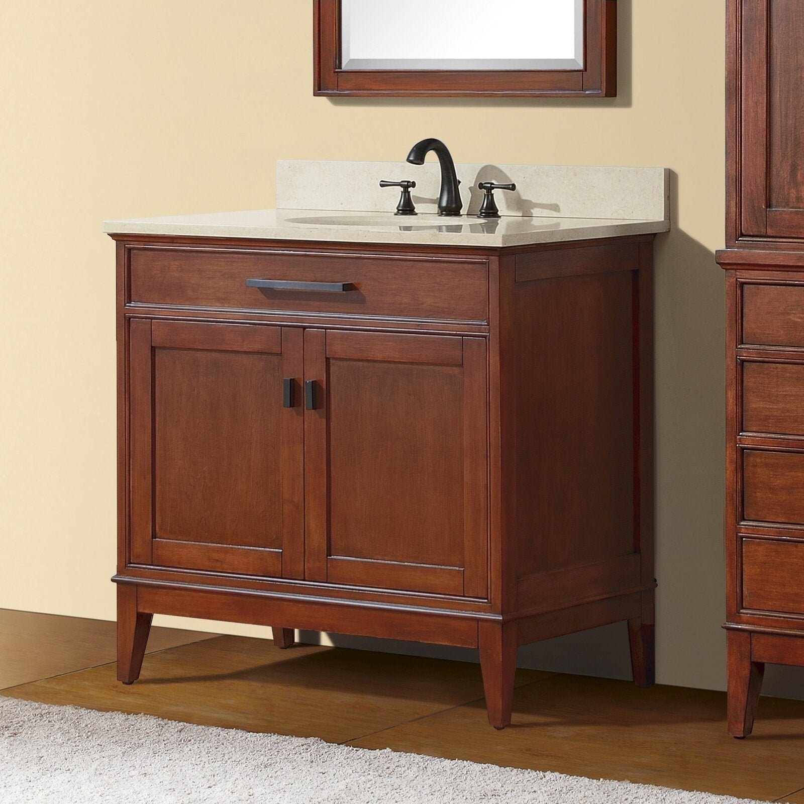 37-inch solid wood single-sink bathroom vanity in warm brown with a stone top and integrated ceramic basin, two-door storage cabinet, dark metal faucet and tapered legs in a modern-contemporary freestanding design.