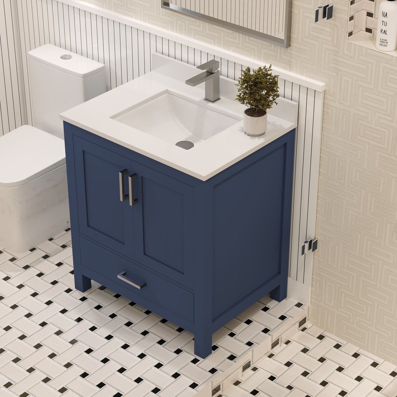 Contemporary solid wood bathroom vanity in navy blue with a white stone countertop and integrated ceramic sink, brushed metal faucet and handles, single-drawer storage and freestanding legs on patterned tile floor.