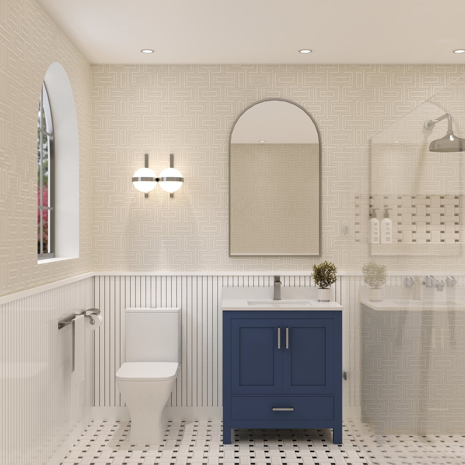Freestanding 30-inch modern single-sink bathroom vanity with a stone countertop and solid wood blue cabinet, brushed metal pulls, rectangular sink, mirror and sconce in a contemporary tiled bathroom.