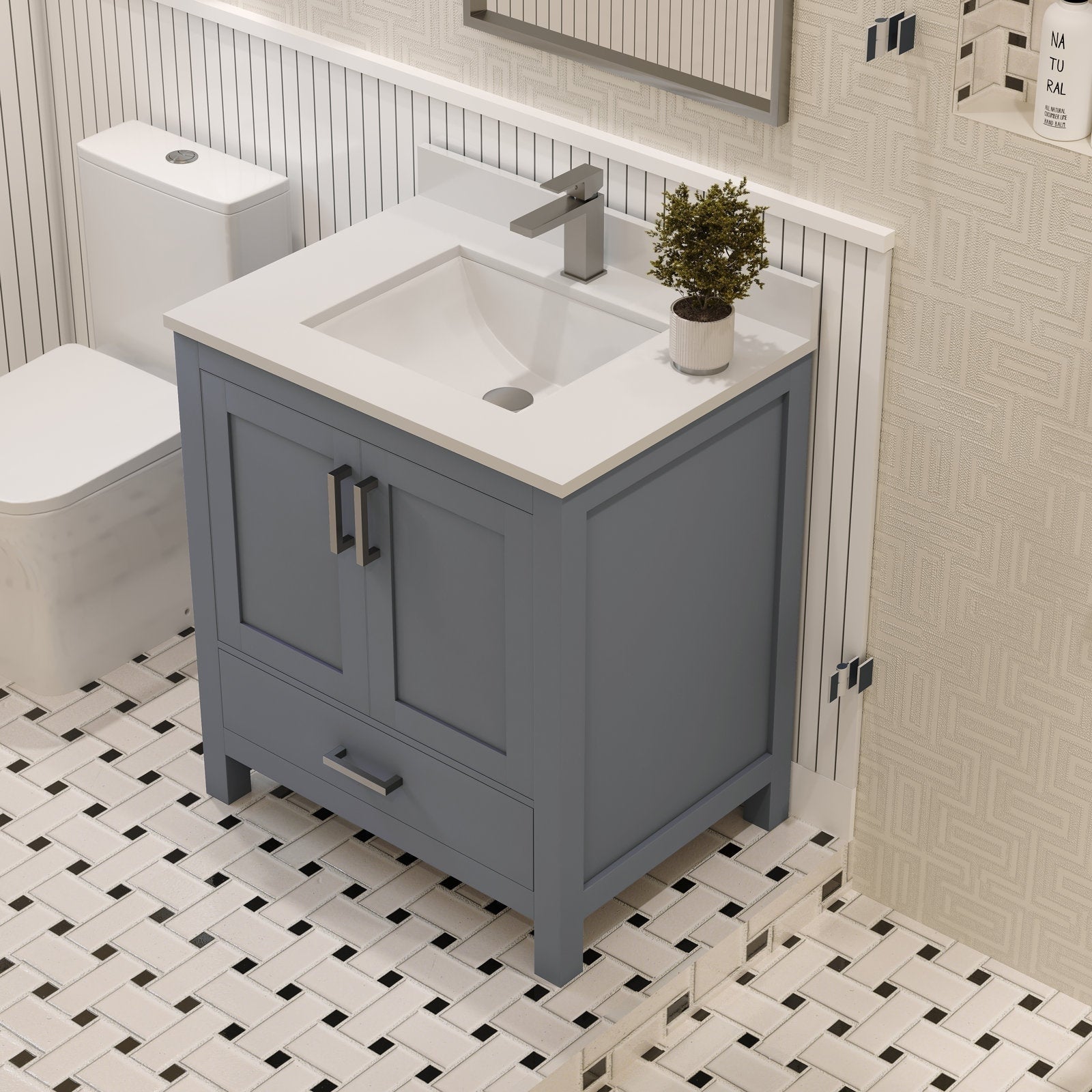 Freestanding modern 30-inch solid wood bathroom vanity in stone-gray with a white stone top and integrated rectangular sink, two-door cabinet and bottom drawer with metal handles shown on patterned tile.