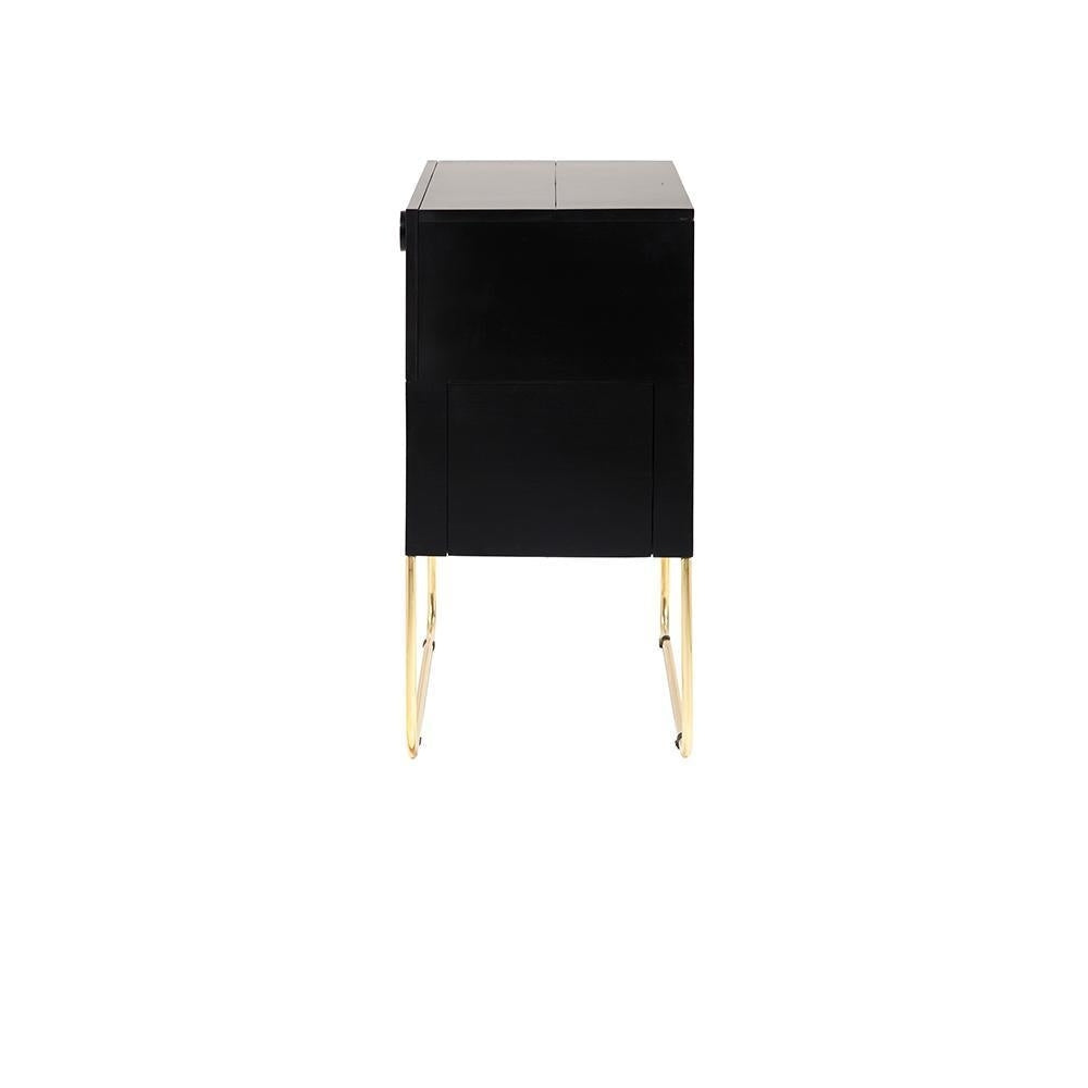 Side view of a dark mahogany drinks cabinet with a smooth rectangular wood body and slim polished brass sled legs, shown isolated on a white background.