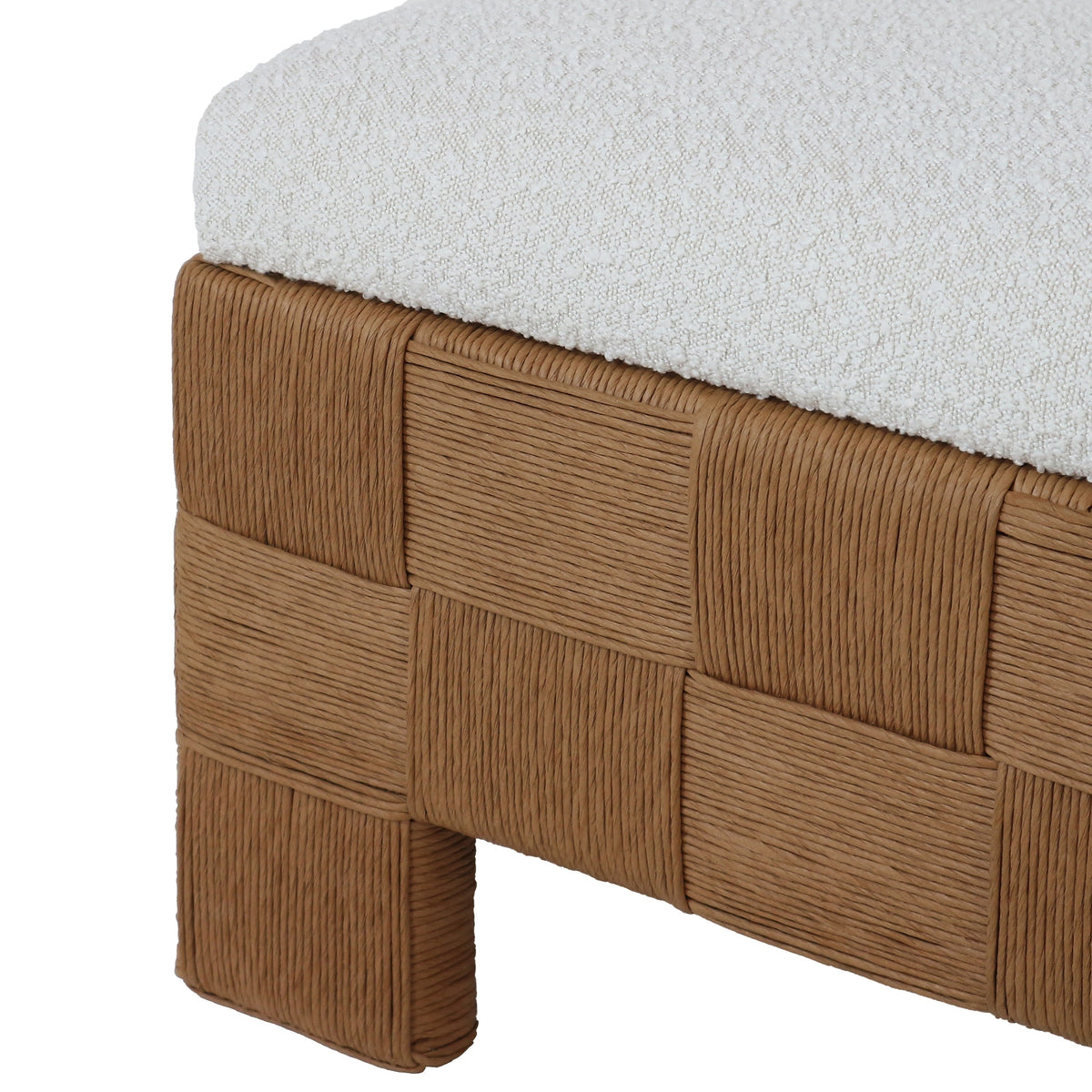 59-inch boucle upholstered bench with a cream fabric cushion set on a woven natural rattan checkerboard base and short rattan feet, low-profile boho-contemporary end-of-bed or entryway bench.