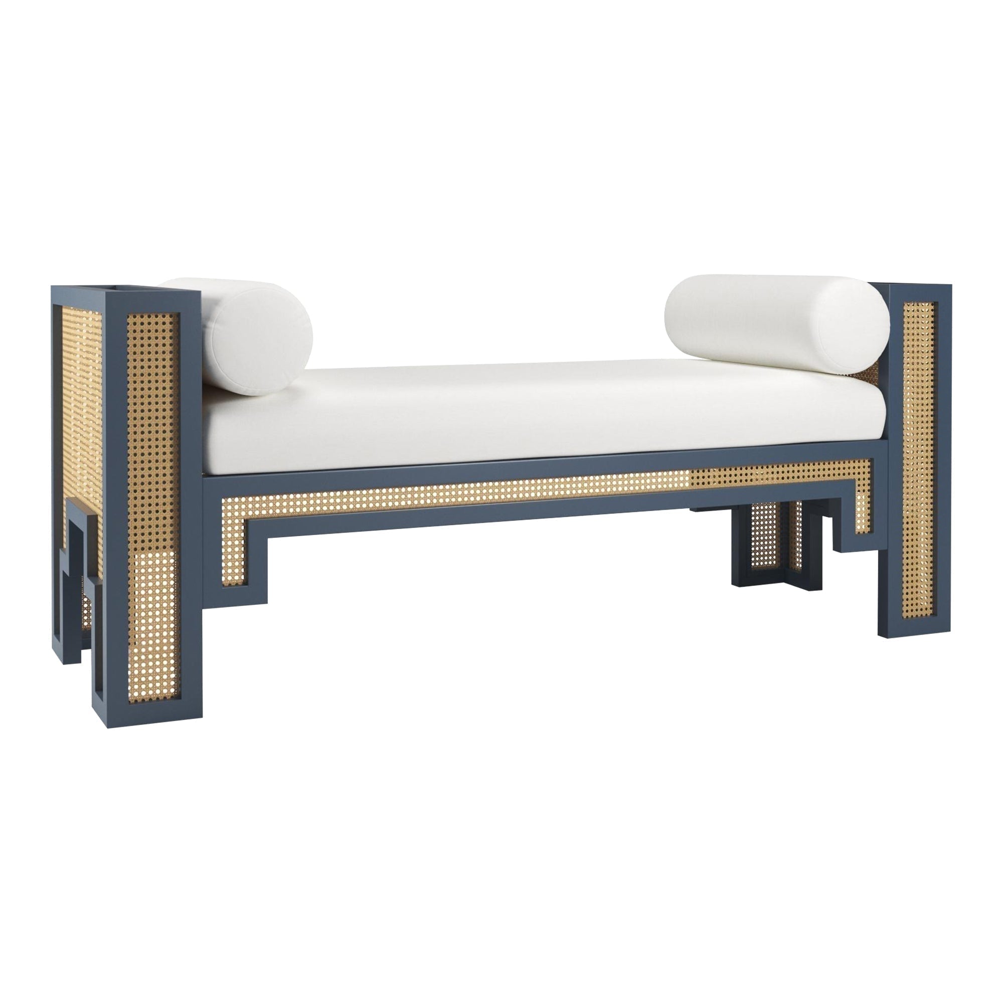 Contemporary end-of-bed bench with a blue painted solid wood frame, natural woven rattan cane panels and a white fabric-upholstered seat topped by two cylindrical bolster pillows.