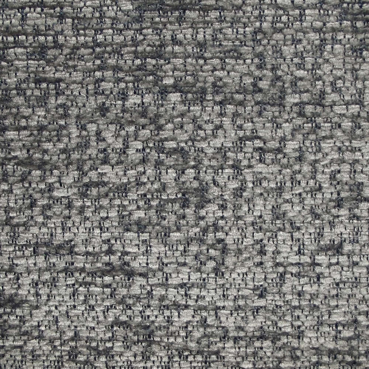 Close-up of grey boucle upholstery fabric showing looped, nubby texture with darker grey and charcoal flecks and a soft woven appearance.