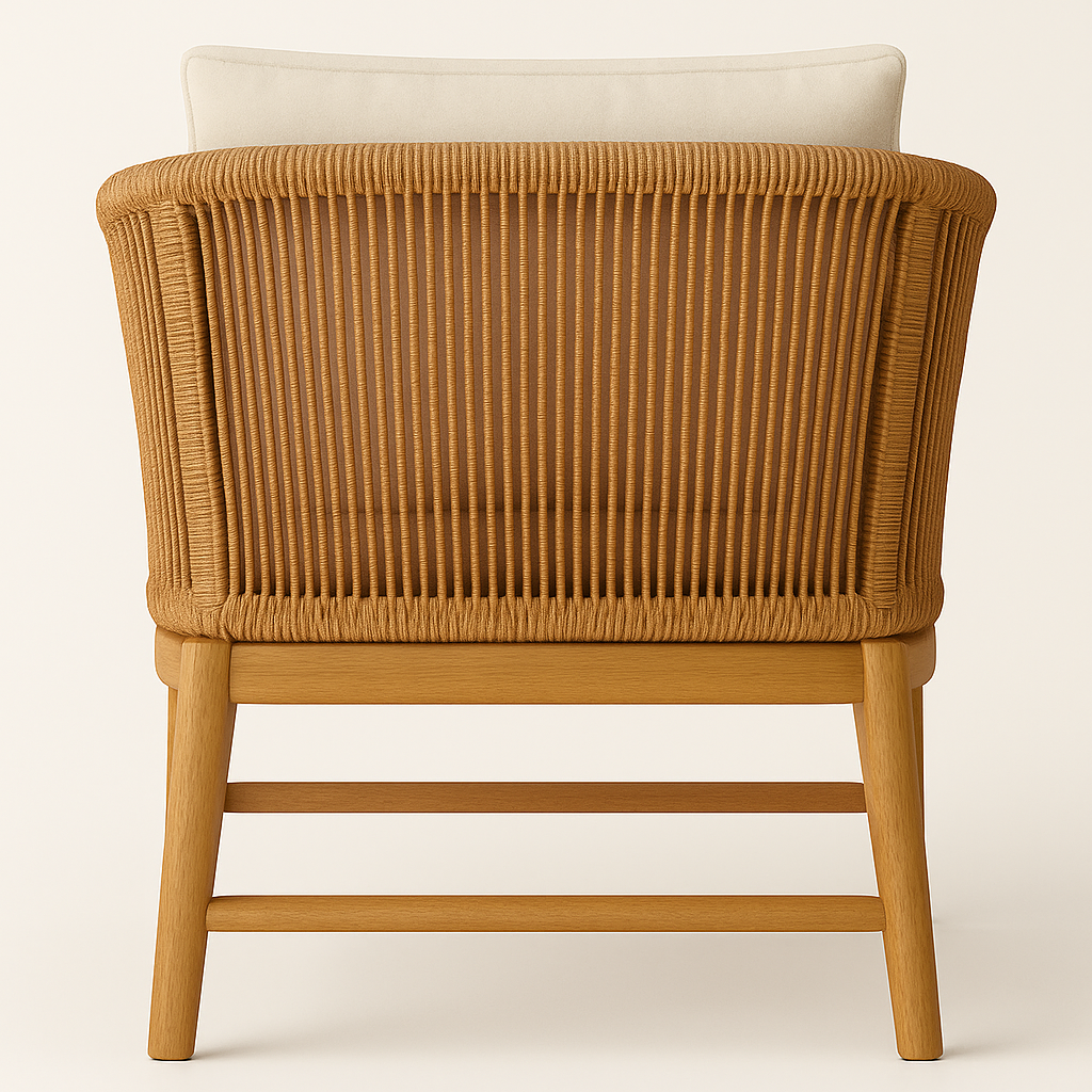 Rear view of a coastal-modern outdoor club chair with a natural teak frame and woven rope back in warm teak tones, showing a low wooden stretcher base and a cream fabric back cushion.