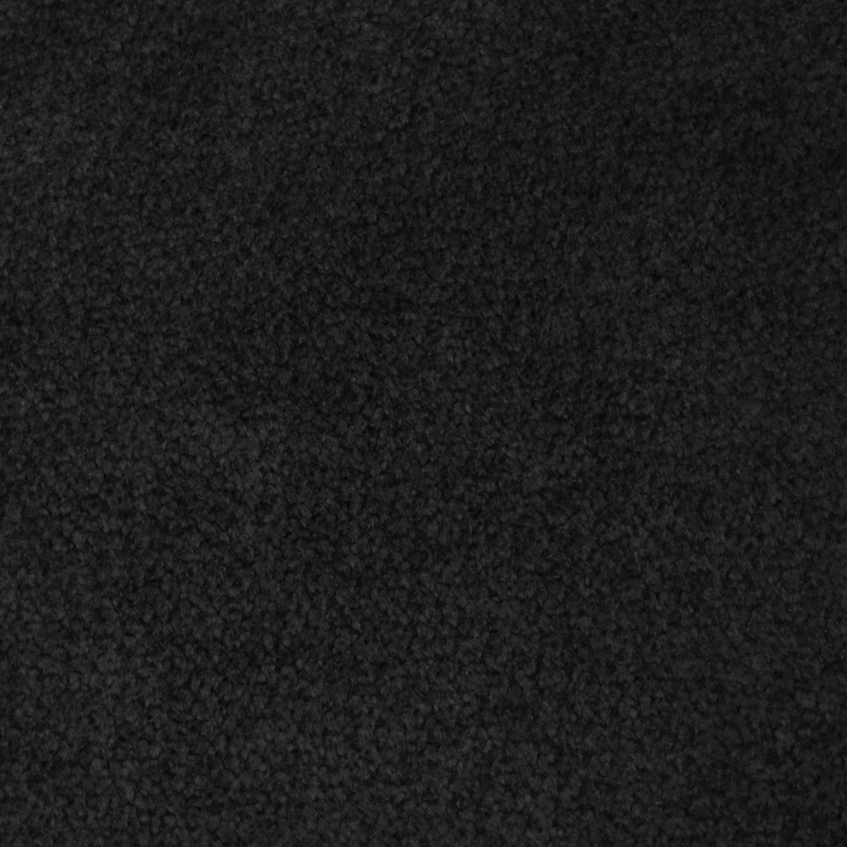Close-up of charcoal boucle upholstery fabric showing soft, nubby texture used for the upholstered seat of the oak bar and counter stool.
