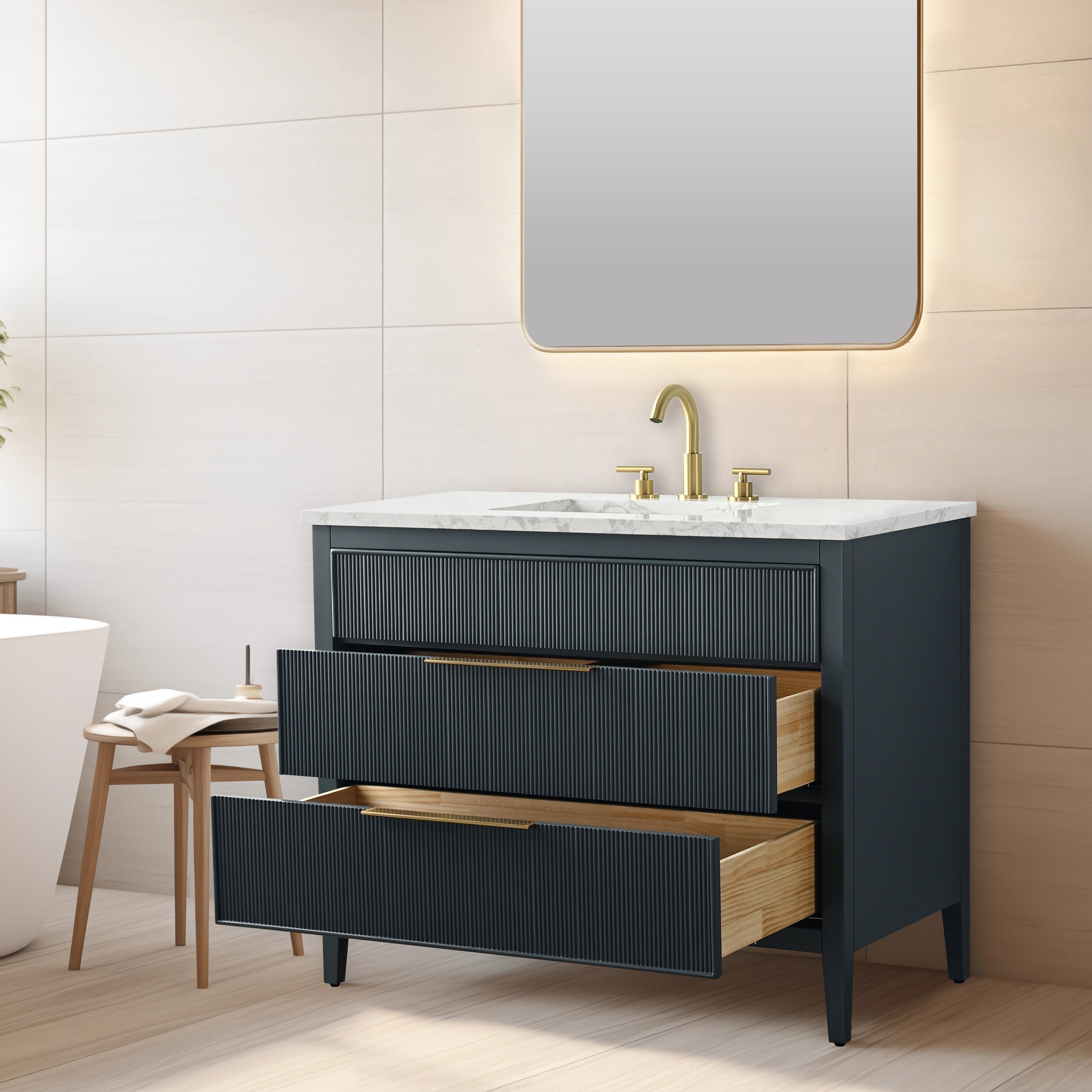 Freestanding modern single-sink bathroom vanity with white stone countertop, solid wood dark-stone cabinet, ribbed fluted drawer fronts and gold faucet; two drawers partially open showing light wood interiors.