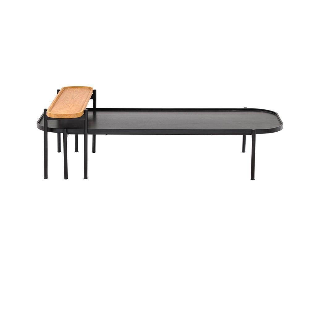 Low-profile modern twin coffee table set with a black metal frame and black mahogany-finish tray top, featuring a removable natural teak serving tray nested at one end.