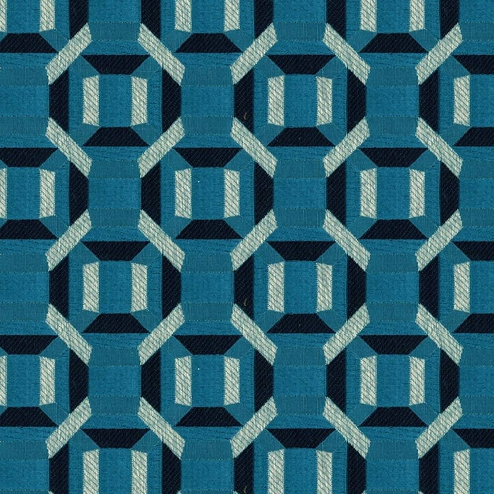 Close-up of woven 100% polyester upholstery fabric in teal and navy with a repeating geometric octagon-and-square motif and light aqua chevron accents, a contemporary modern pattern for sofas.