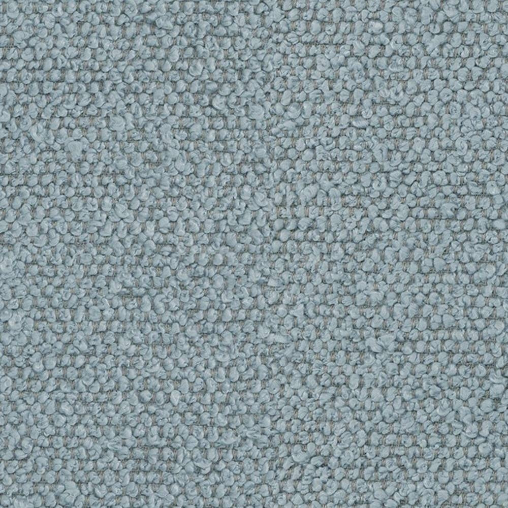 Close-up of neutral cream 100% polyester bouclé upholstery fabric showing dense looped texture, ideal for sofas and indoor upholstery.