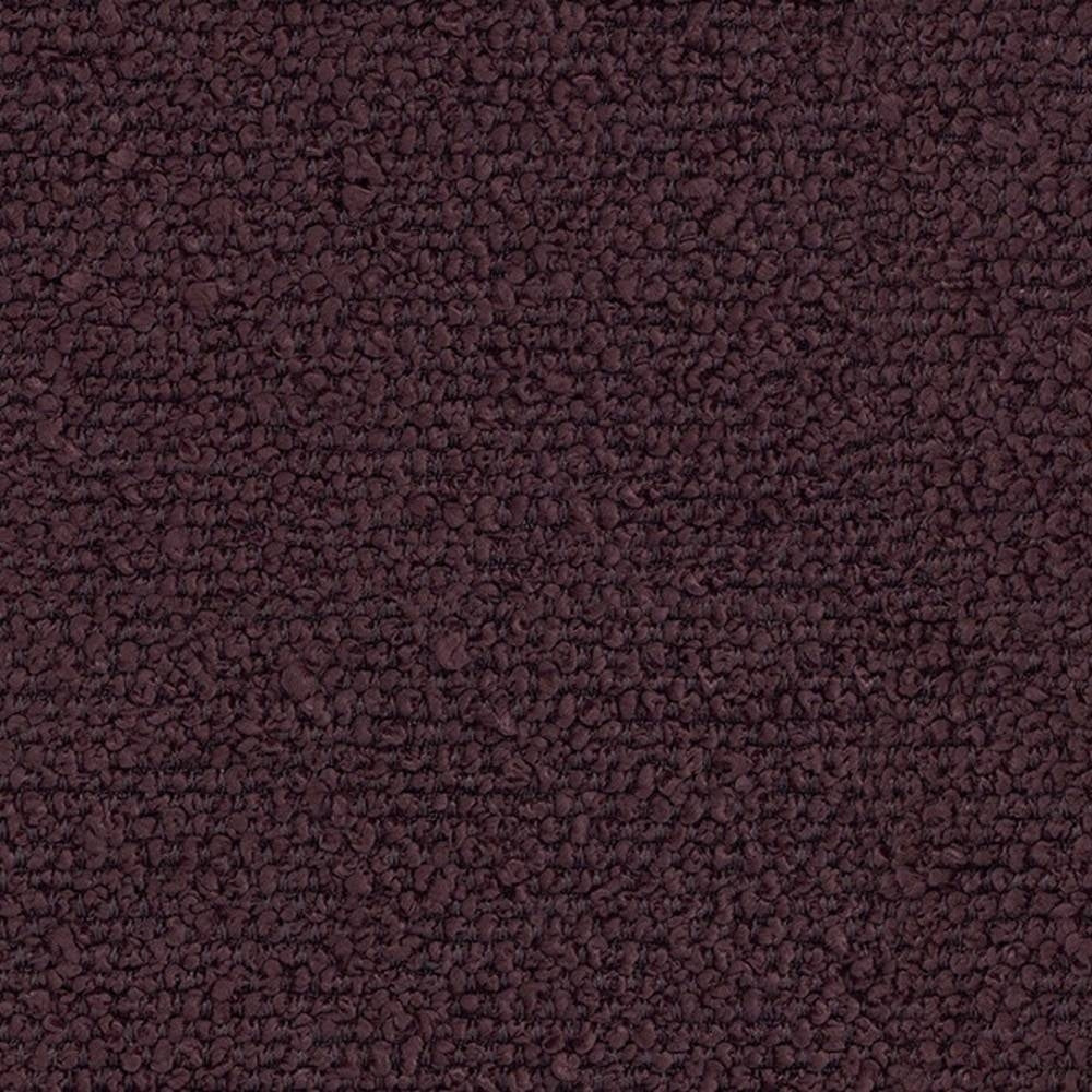 Close-up of dark plum 100% polyester bouclé upholstery fabric showing dense looped texture, ideal for sofas and indoor upholstery.