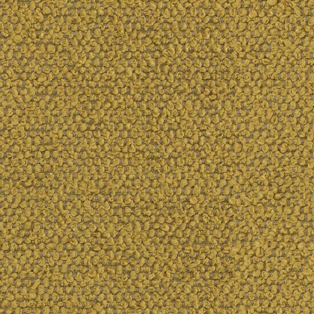 Close-up of mustard-yellow bouclé upholstery fabric in 100% polyester showing tight looped, pebble-like texture ideal for sofas and indoor upholstery.
