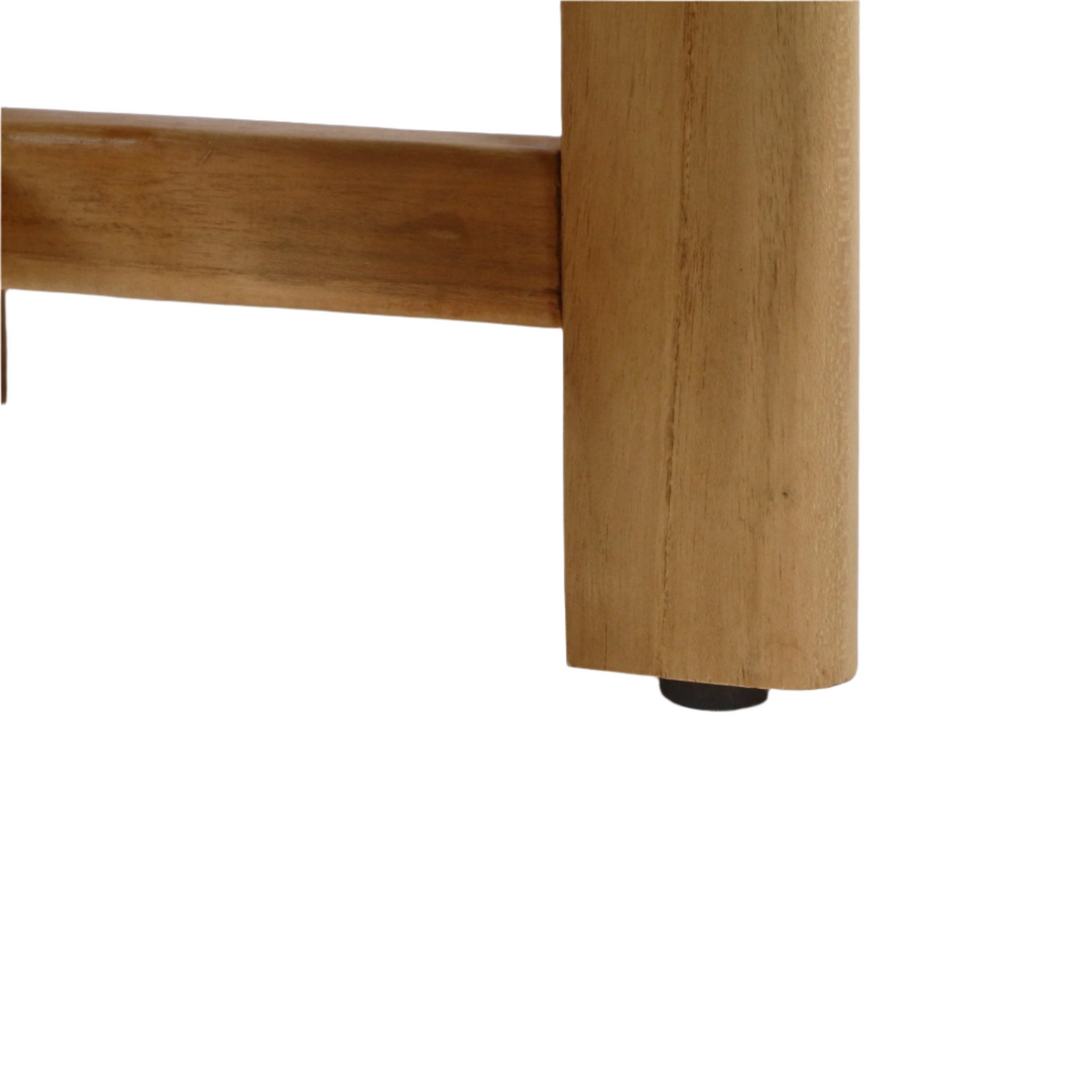 Close-up of a teak shower stool showing the rounded natural wood leg, horizontal support bar, visible wood grain, and a small black rubber foot glide at the base.