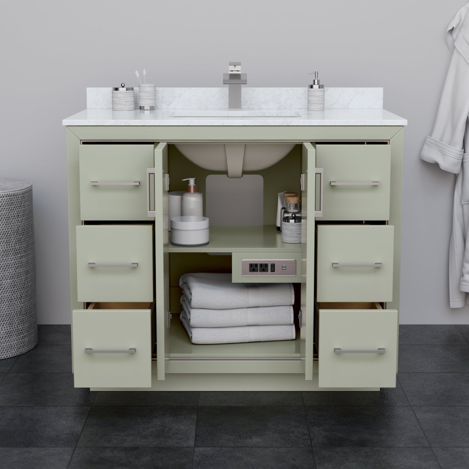 Freestanding 42-inch modern solid wood bathroom vanity in stone with a white stone countertop, undermount ceramic sink, brushed-nickel hardware and open center cabinet showing folded towels, toiletries and a built-in outlet.
