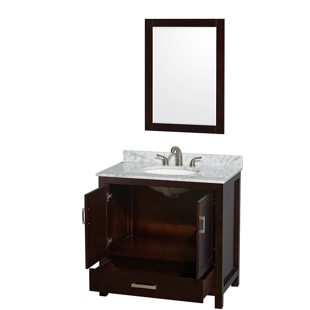 Modern solid-wood bathroom vanity in a dark finish with a stone marble top, undermount ceramic sink and brushed-nickel faucet; matching framed mirror above, cabinet doors open to reveal storage and lower drawer.
