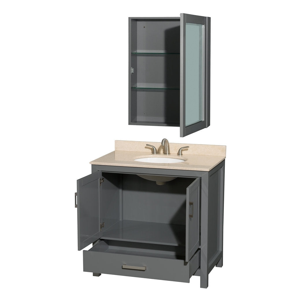Modern gray solid-wood bathroom vanity with a beige stone countertop and white ceramic undermount sink, brushed nickel faucet, open cabinet doors and lower drawer; matching wall-mounted mirrored medicine cabinet with glass shelves.