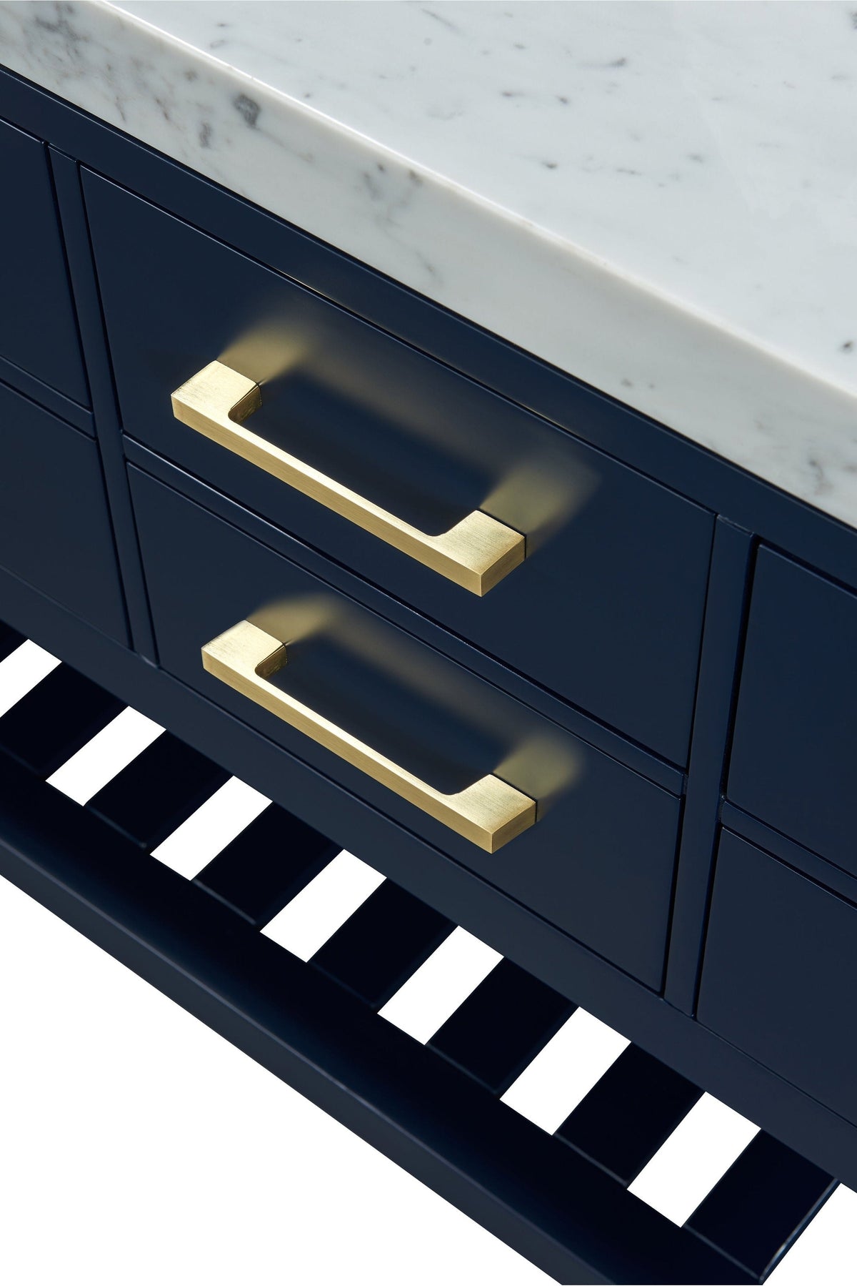Close-up of a solid wood single-sink vanity showing a white stone marble top, dark painted wooden drawer fronts and brushed gold rectangular drawer handles.