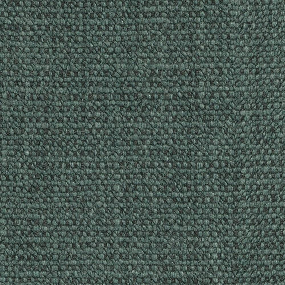 Close-up of teal-green looped upholstery fabric with a tight woven texture, a durable 18% wool / 67% acrylic / 15% polyester blend designed for modern indoor sofa upholstery.