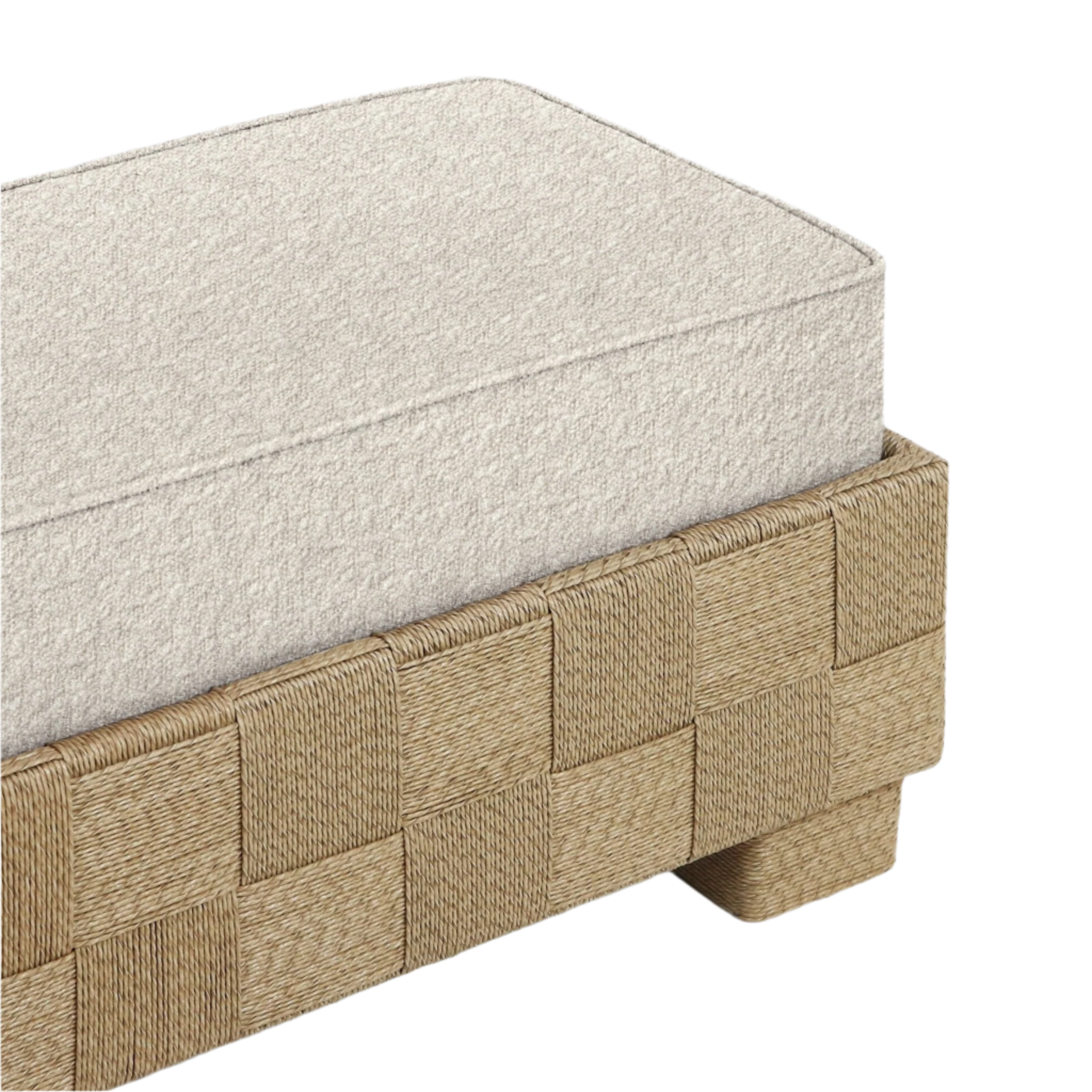 Close-up of a beige boucle-upholstered bench cushion resting on a natural seagrass woven checkerboard base with a short block leg, highlighting the textured fabric and braided weave.