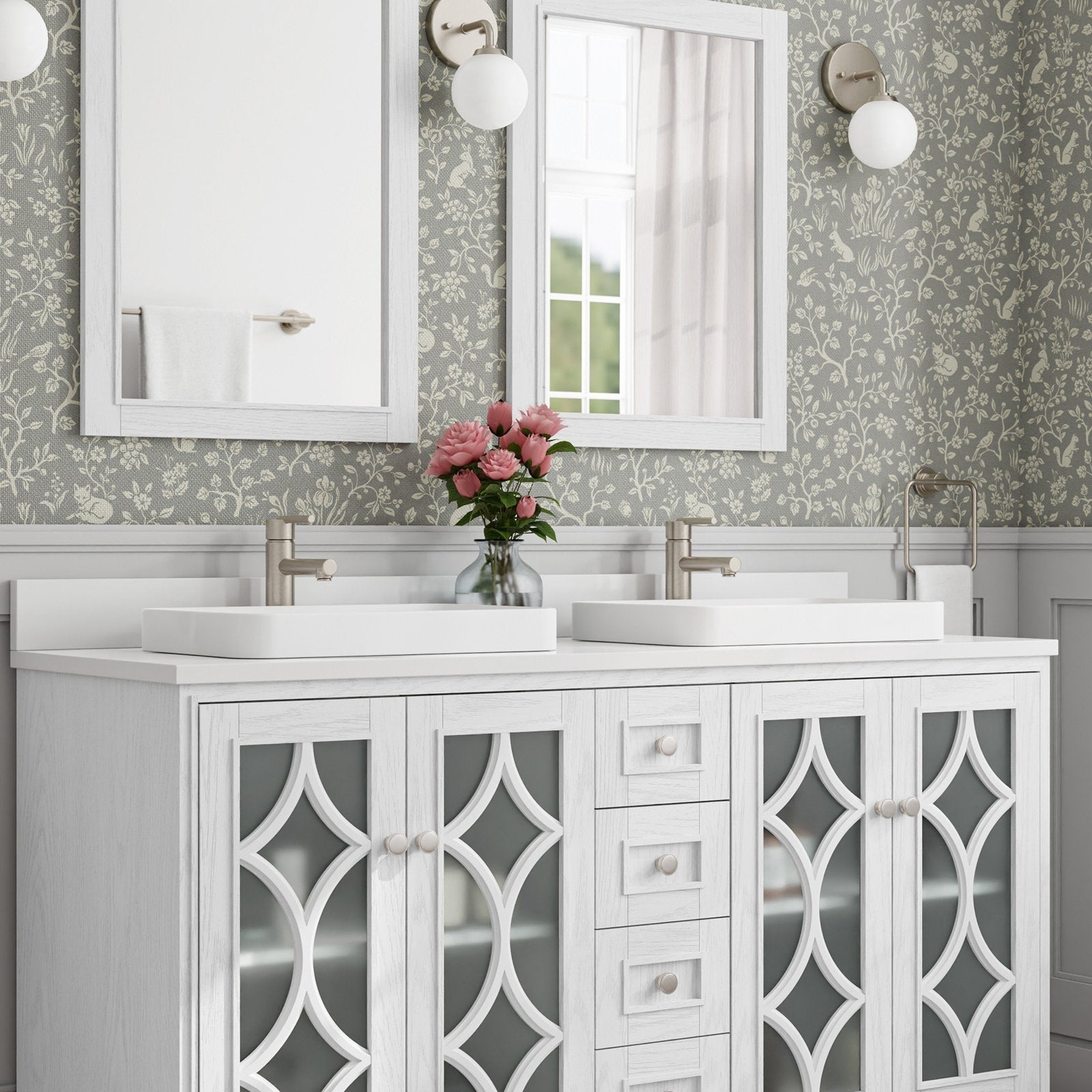 Modern stone-top 60-inch freestanding double bathroom vanity in whitewashed solid wood with decorative frosted-glass cabinet doors, two rectangular white ceramic vessel sinks, brushed nickel faucets and a vase of pink flowers.