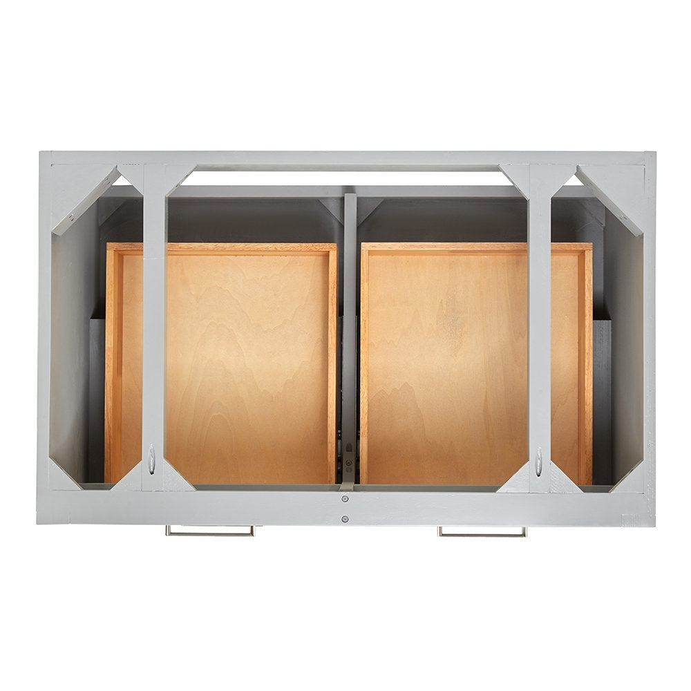 Top view of a modern stone-colored bathroom vanity showing the open freestanding frame, two solid wood drawer boxes inside, a center divider, and visible brushed-nickel drawer pulls.