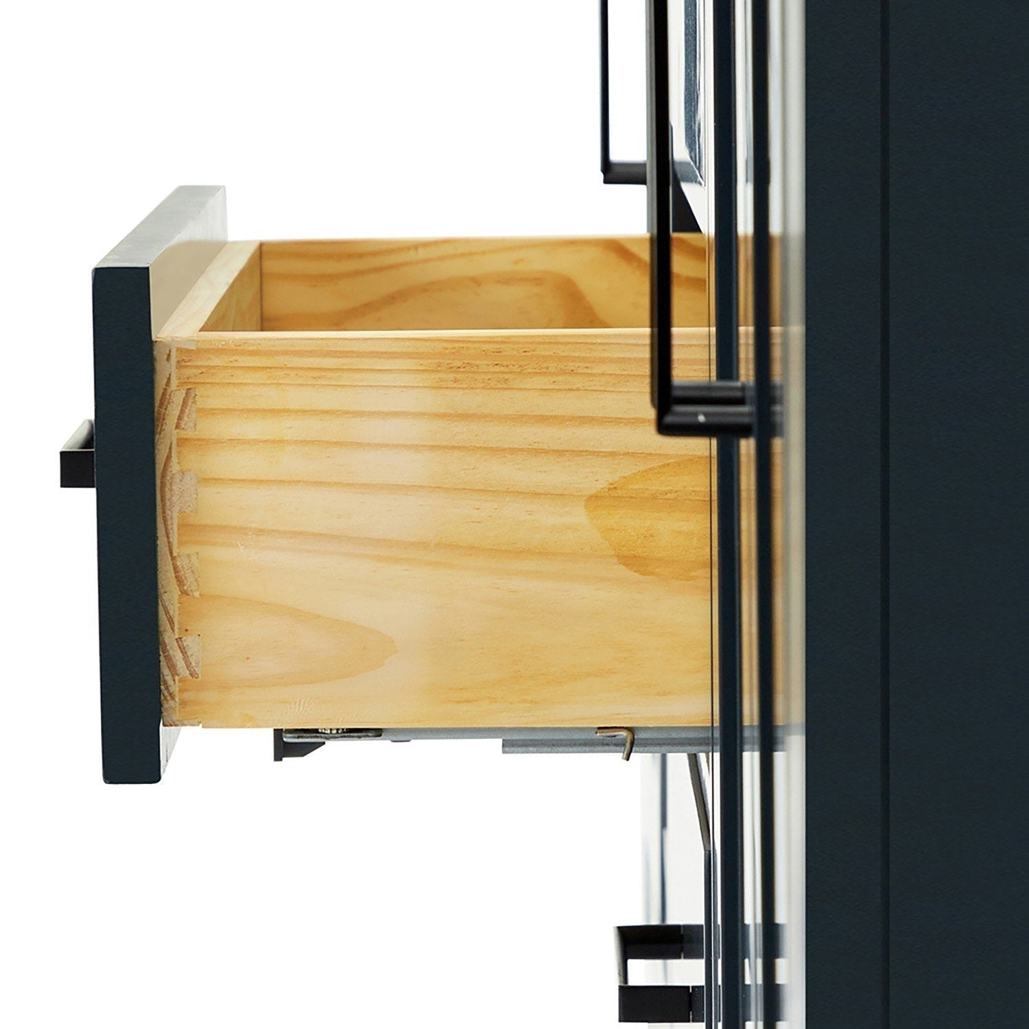 Close-up of a solid wood vanity drawer with visible dovetail joints and natural wood grain, pulled from a matte black modern vanity showing black rectangular handles and a metal drawer slide.