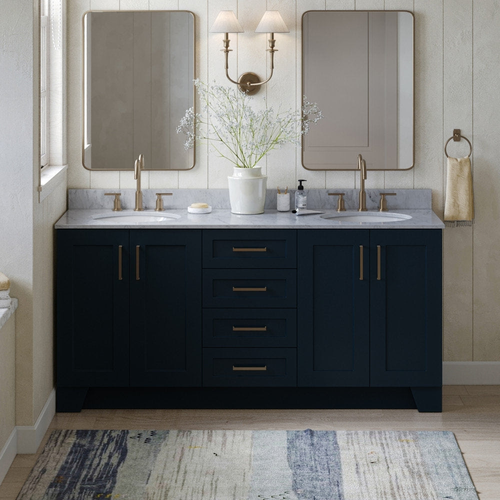 73-inch solid wood double-sink bathroom vanity in deep navy with a light stone countertop, satin bronze faucets and hardware, undermount white sinks, central drawers and two mirrors.