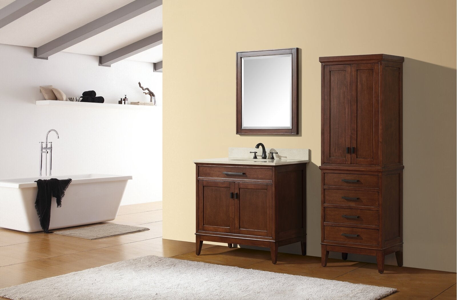 37-inch solid wood single-sink bathroom vanity in warm brown with a light stone countertop, dark metal faucet, matching framed mirror and a tall storage cabinet beside a freestanding bathtub in a modern bath setting.