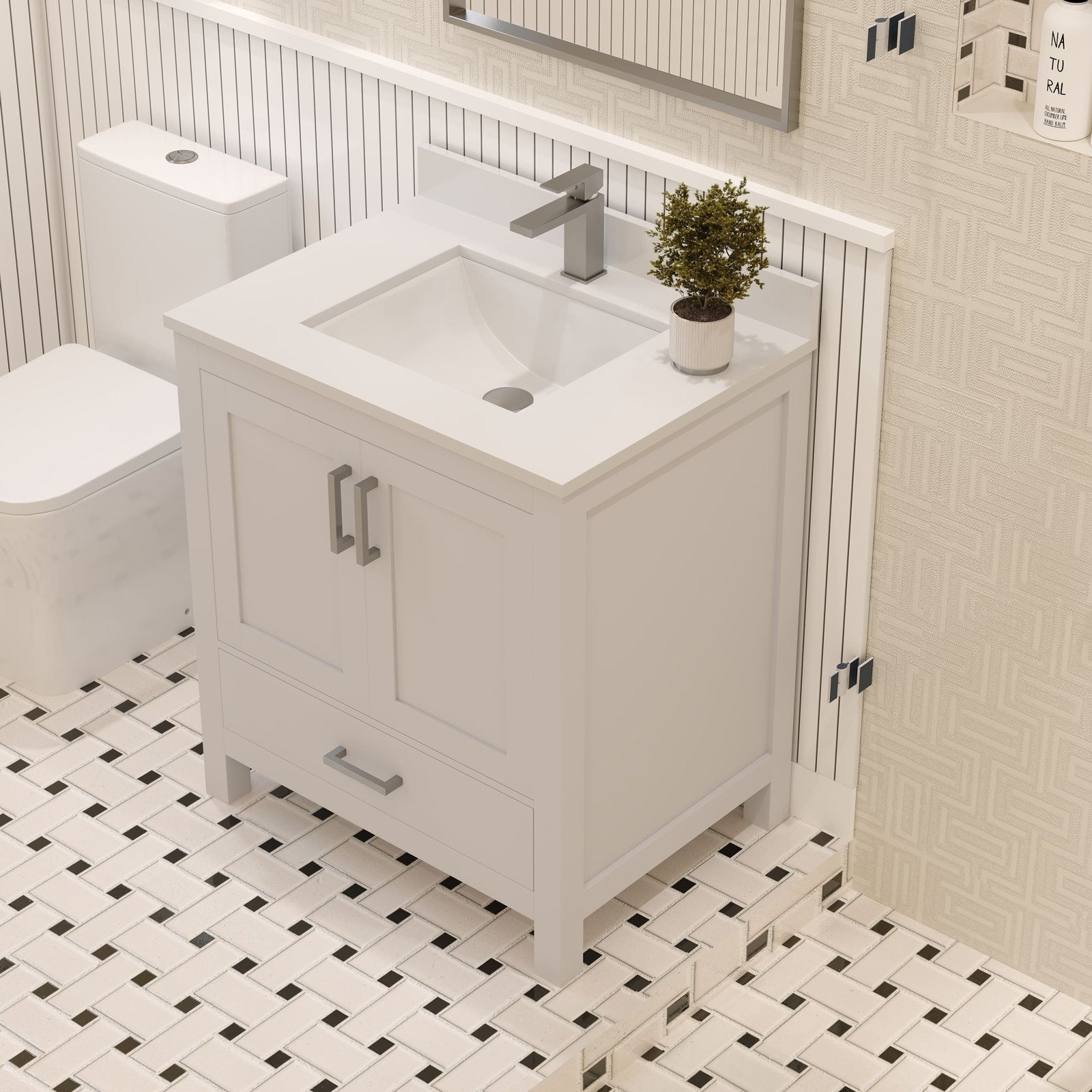 Modern 30-inch freestanding solid wood bathroom vanity in stone finish with a stone top and integrated rectangular ceramic sink, single metal faucet, two doors and a lower drawer with metal handles on black-and-white tile.