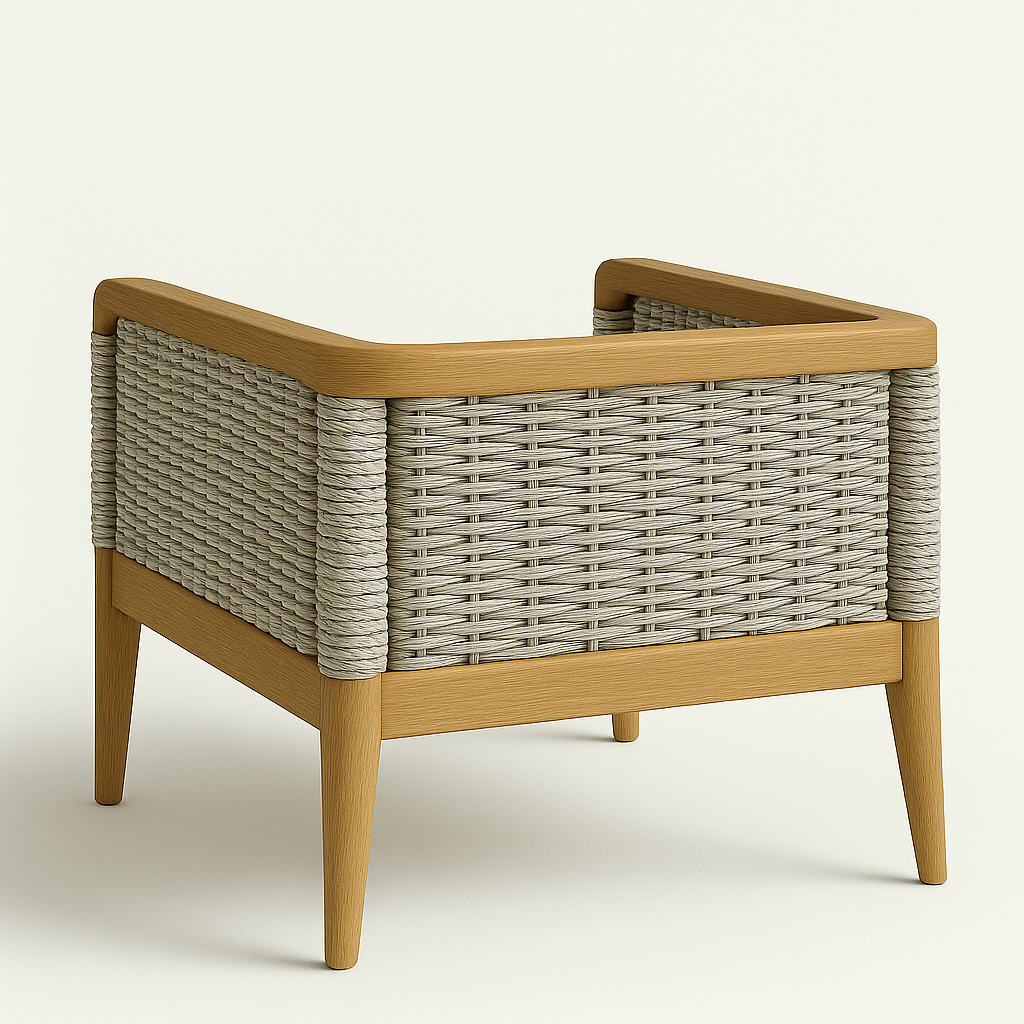 Three-quarter rear view of an outdoor lounge chair with a natural teak frame and cream woven wicker sides, rounded teak top rail and tapered legs, showcasing coastal-modern design and rope-wrapped corner posts.