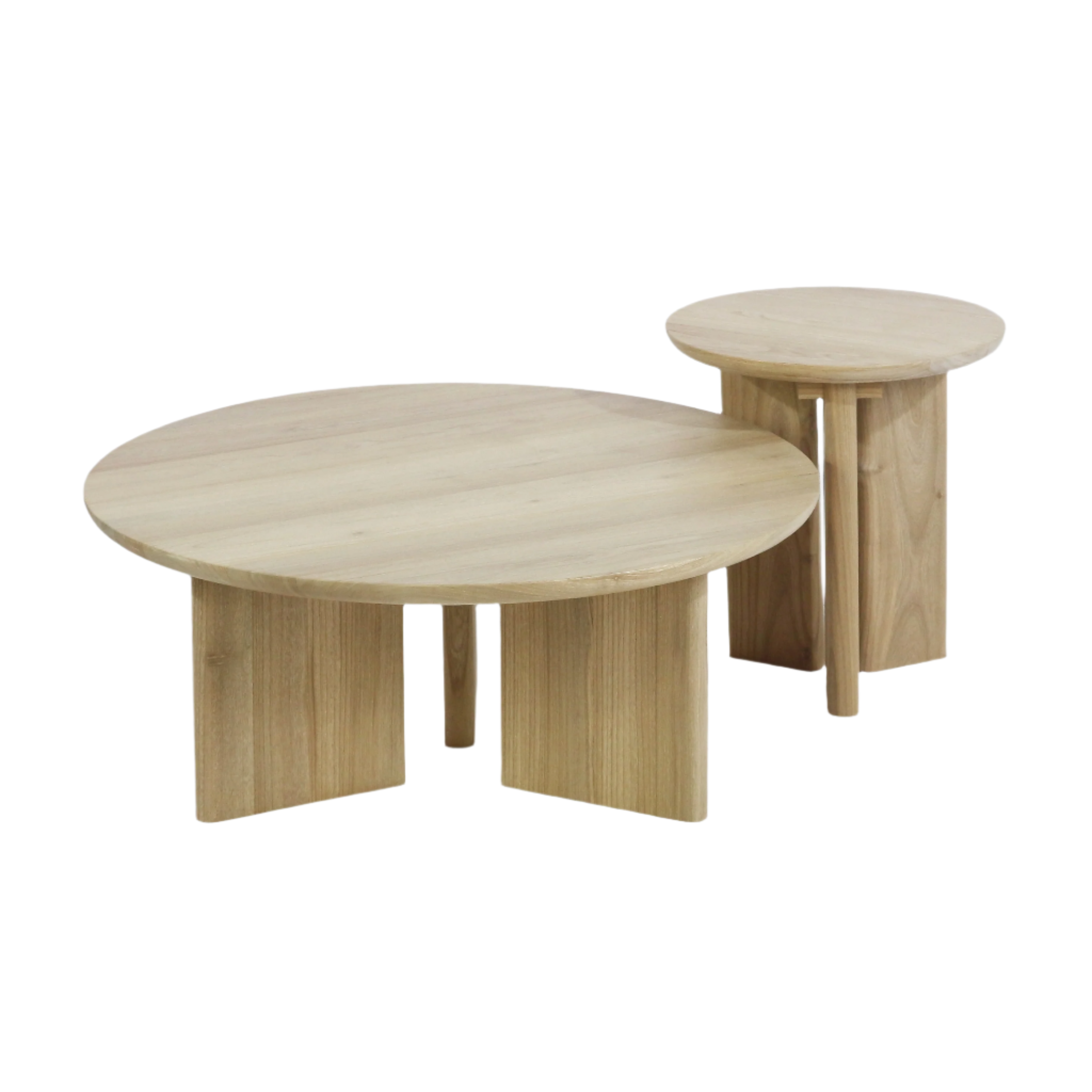 Pair of round solid oak nesting tables in a light natural oak finish: a low wide coffee table and a smaller side table, each with thick circular tops and curved panel legs in a modern minimalist style.