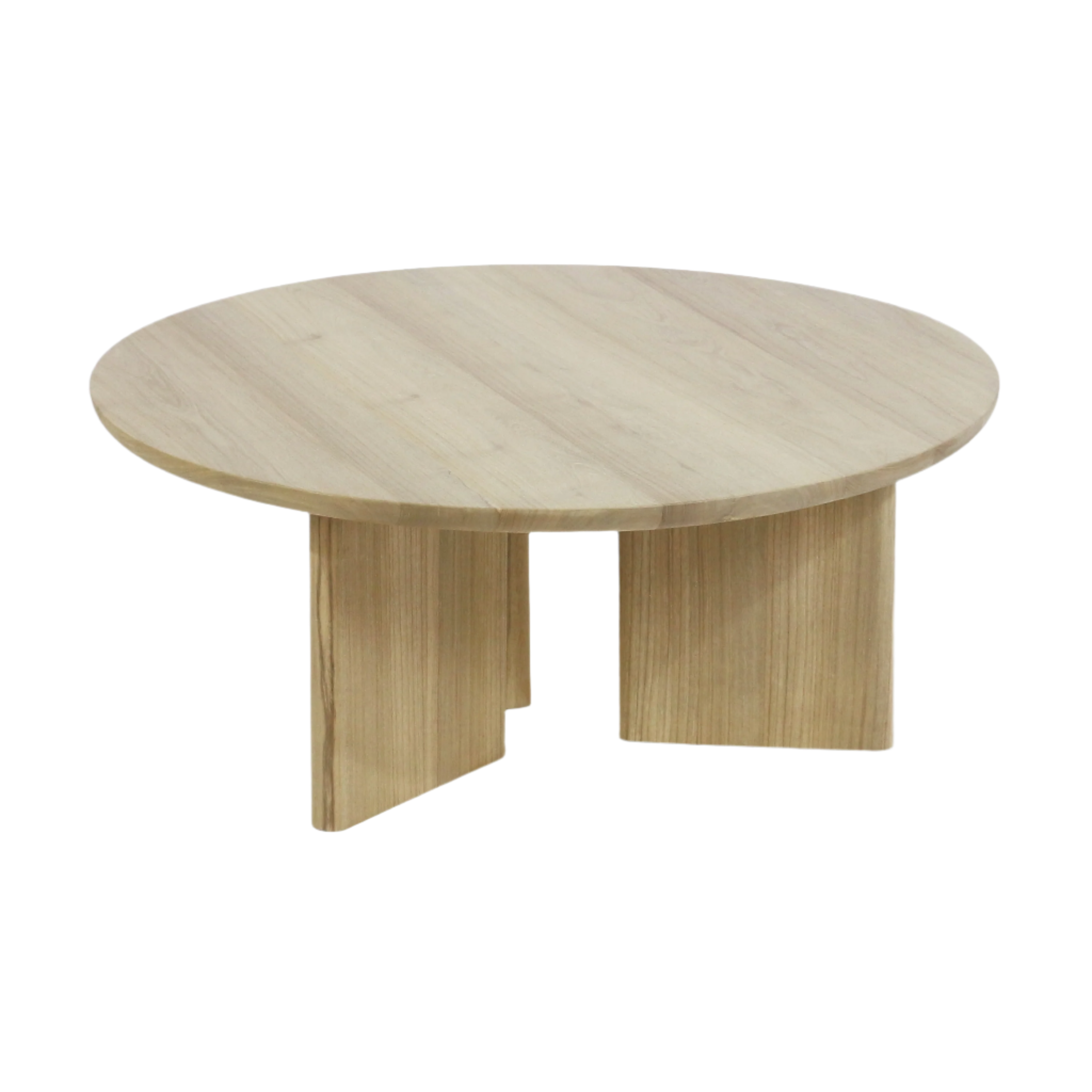 Round solid oak coffee table with a thick natural oak top and sculptural three-panel pedestal base, shown in a light beige oak finish on a white background.
