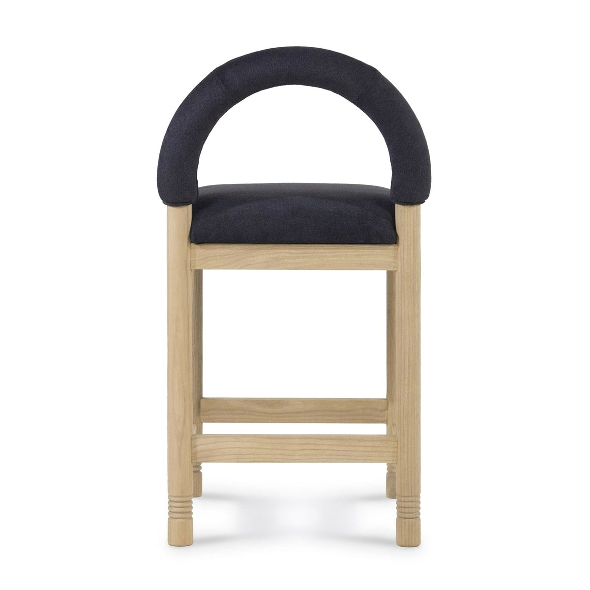 Front view of a bar/counter stool with a natural oak frame and low arched back upholstered in charcoal bouclé fabric, padded seat and horizontal oak footrest rails.