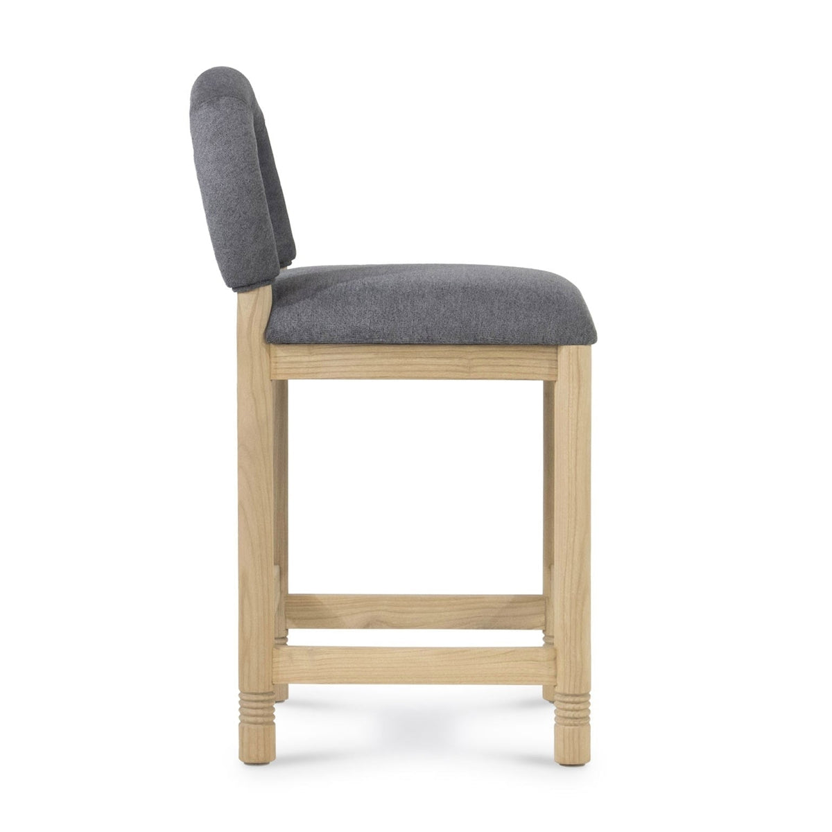Side profile of a stool with a natural oak frame and gray bouclé upholstered seat and low back, showing square legs, stretcher footrest and subtle leg detailing.