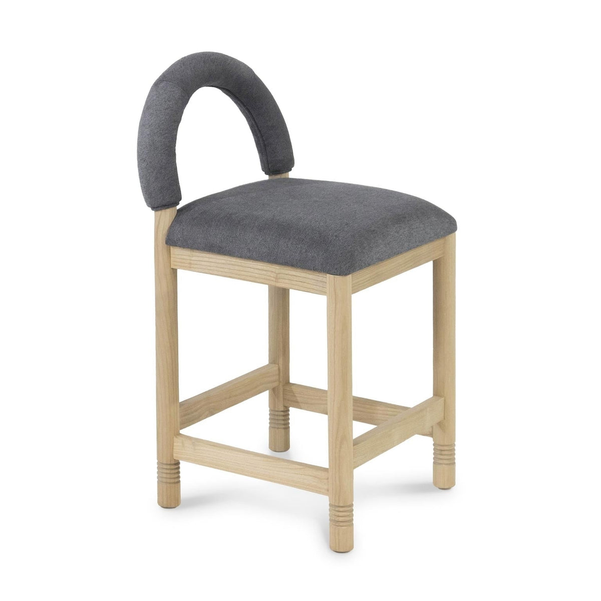 Counter-height stool with a natural oak frame and cushioned seat upholstered in charcoal-gray bouclé, featuring a low padded arched back and supportive stretcher footrests in a contemporary coastal style.
