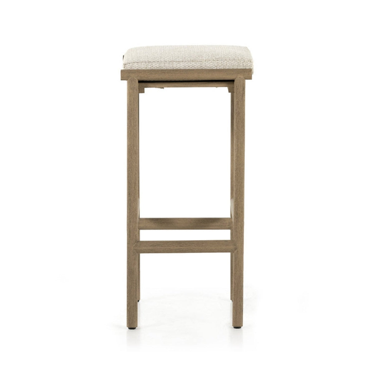 Front view of a backless outdoor bar stool featuring a teak wood frame and beige upholstered seat cushion, minimalist coastal-contemporary design with straight legs and a rectangular footrest.