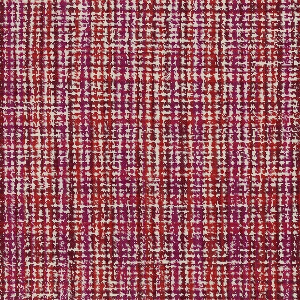 Close-up of 100% polyester upholstery fabric with red and magenta woven threads and a white flecked grid-like texture, shown as a contemporary sofa fabric sample.