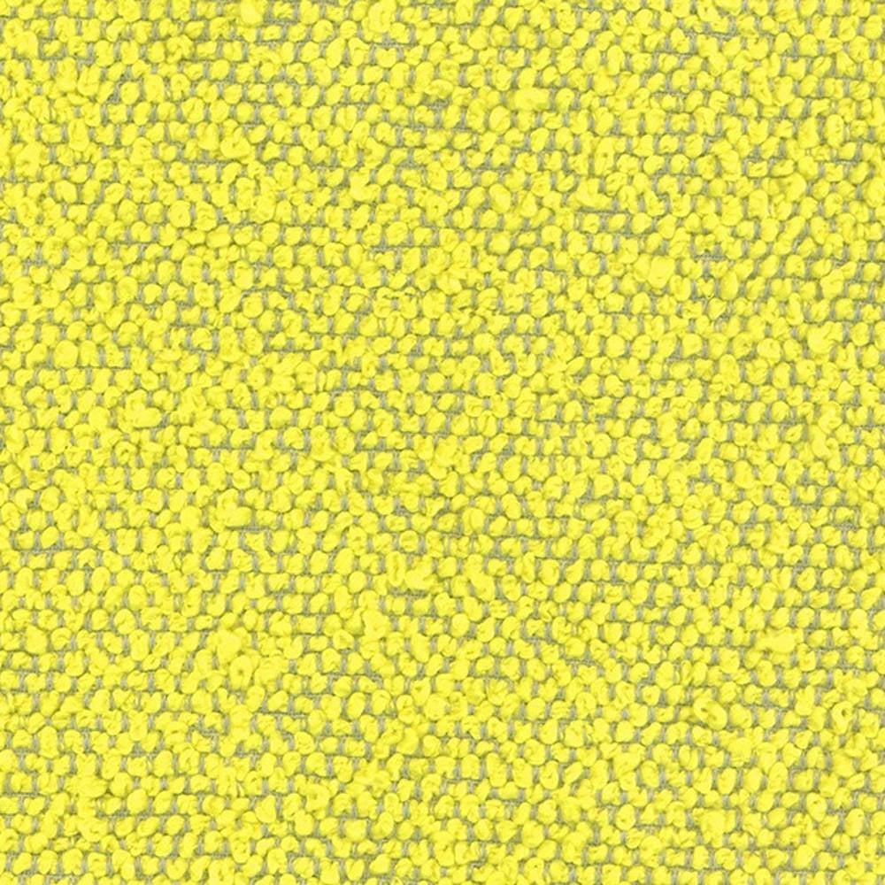 Close-up of bright yellow bouclé upholstery fabric showing dense looped texture, 100% polyester ideal for sofas and Allmodern-style interiors.