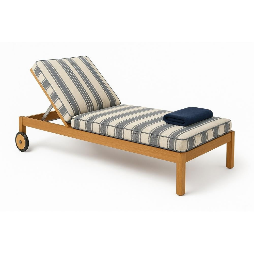 Teak-frame outdoor chaise lounger with cream and gray striped fabric cushions, adjustable back supported by aluminum hardware, a folded navy towel on the seat, and rear wheels for easy mobility.
