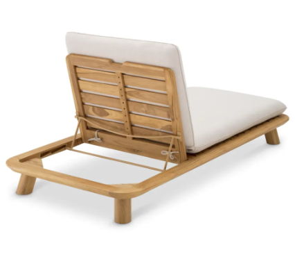 Rear three-quarter view of a natural teak sun lounger with a slatted adjustable back, off-white fabric cushions, and a low rounded teak frame with short legs.
