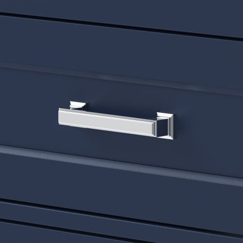 Close-up of a polished chrome rectangular drawer handle mounted on a stone-colored solid wood modern vanity drawer with horizontal recessed paneling.