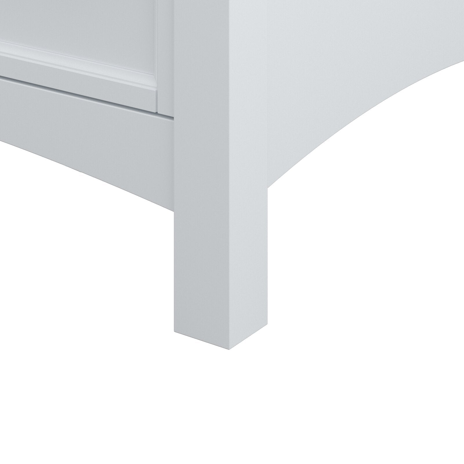 Close-up of the corner leg and curved apron of a white solid wood bathroom vanity, showing the smooth painted finish and recessed toe-kick detailing.
