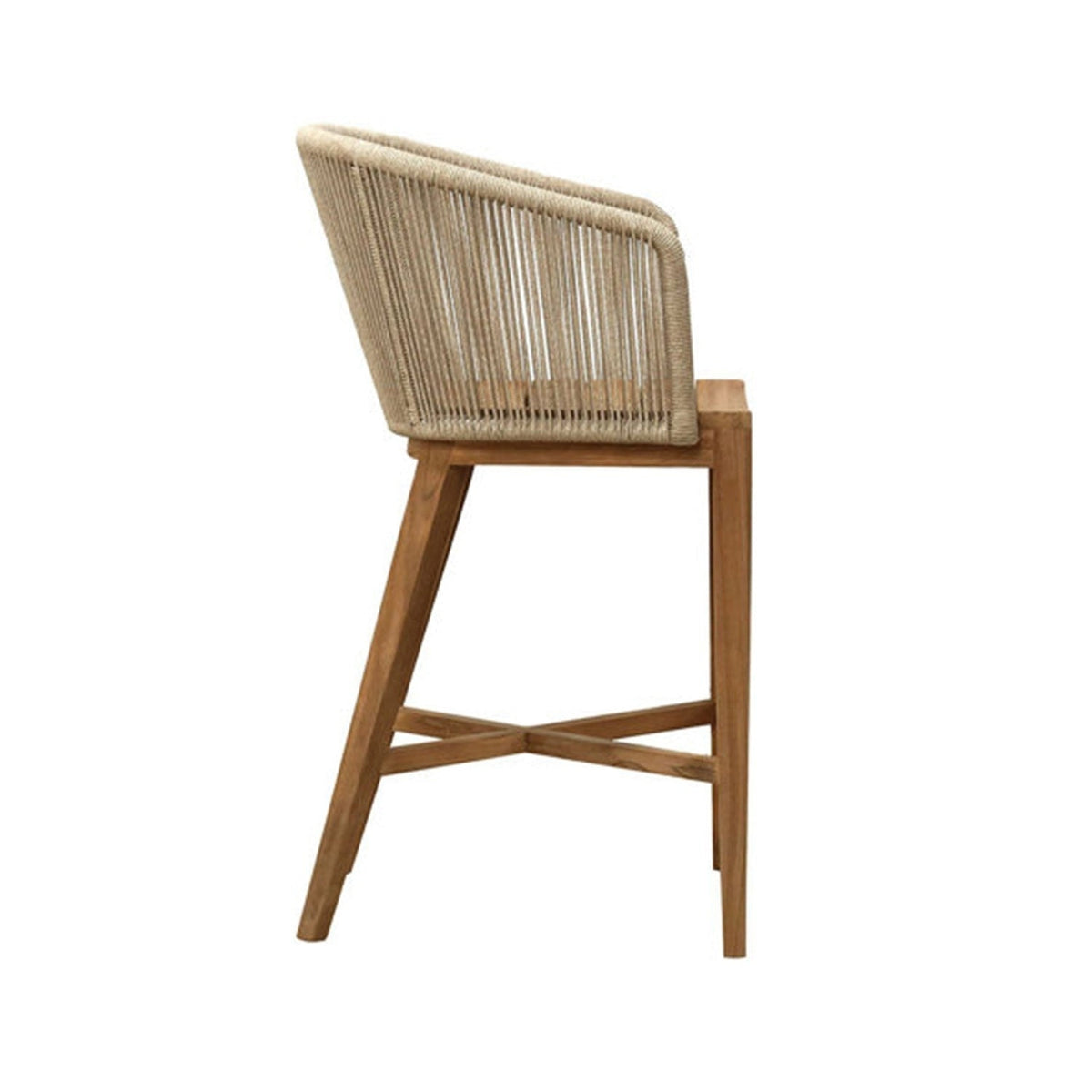 Side view of a natural teak outdoor bar stool with an angled solid-teak frame, cross-braced footrest and a woven natural rope backrest in a coastal-modern style.