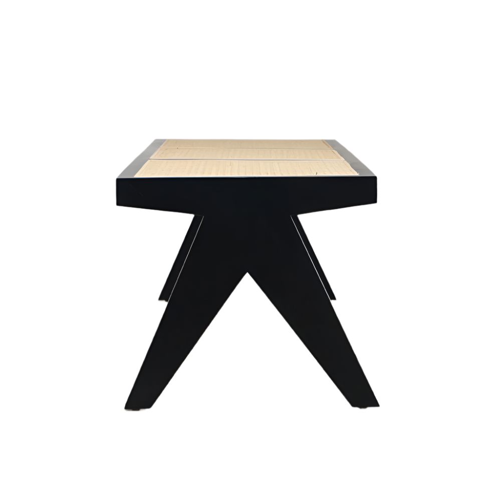Front view of a modern backless bench with a black solid-wood frame and natural cane woven seat supported by angled X-shaped legs.