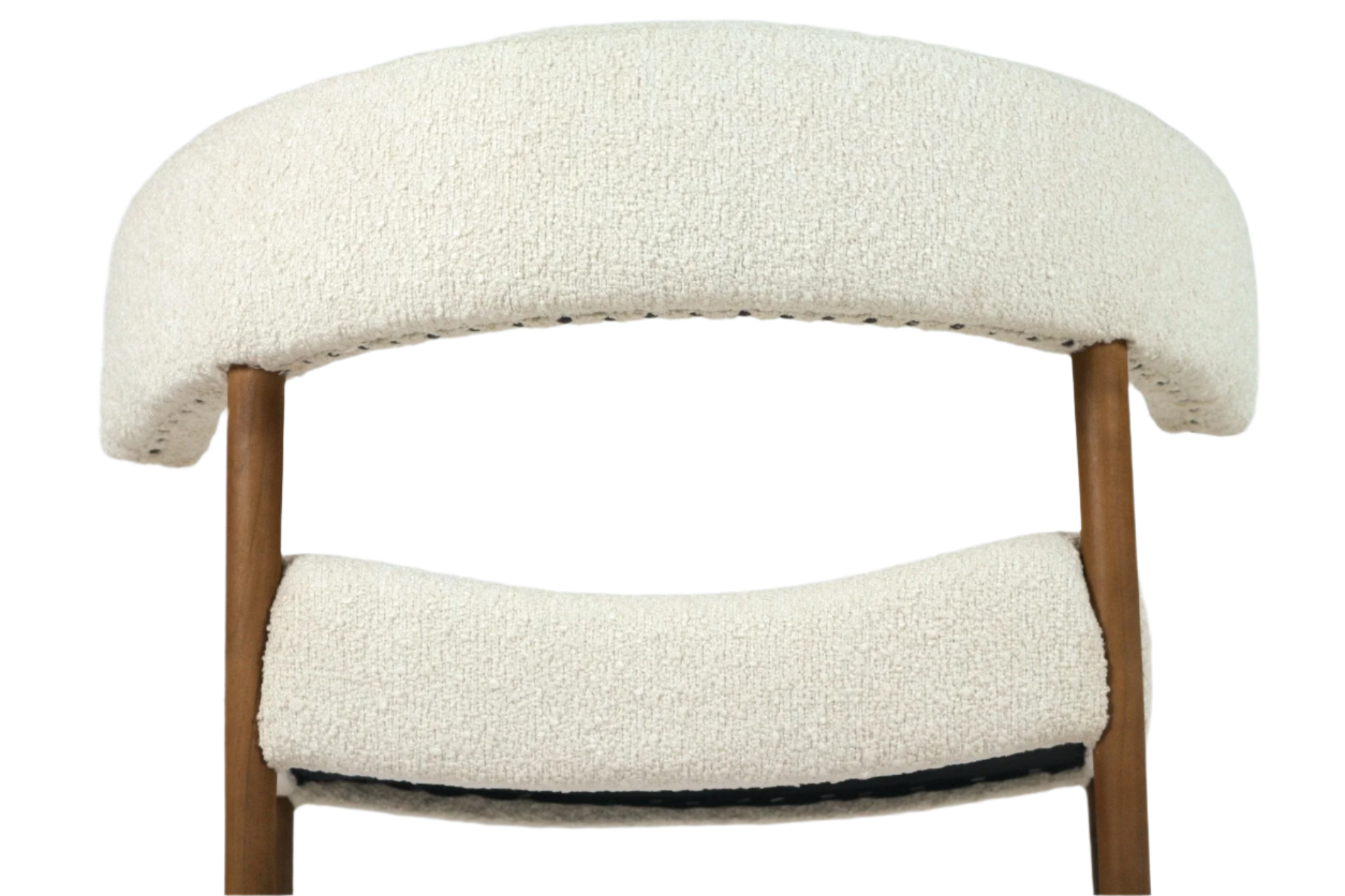 Close-up of a cream alpaca boucle dining chair showing a curved upholstered backrest and padded seat in textured cream fabric with visible natural wood legs, emphasizing the chair's mid-century modern profile.