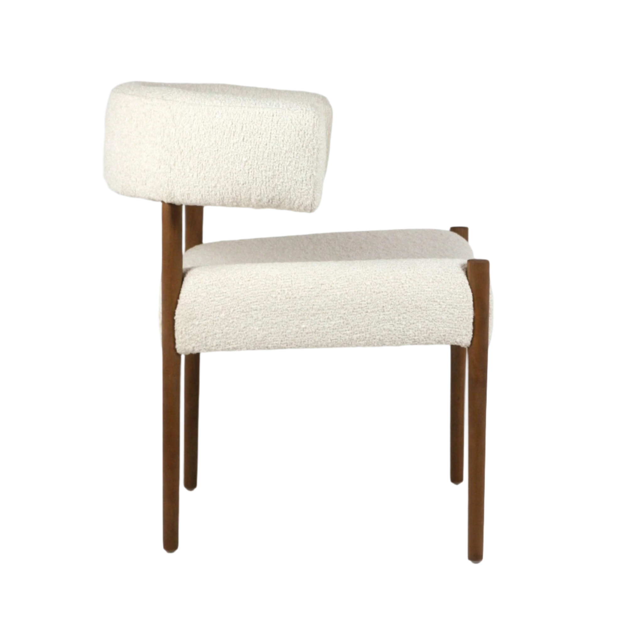Side profile of a cream alpaca bouclé dining chair with a curved upholstered back and seat, supported by slim natural wood legs in a modern mid-century style.