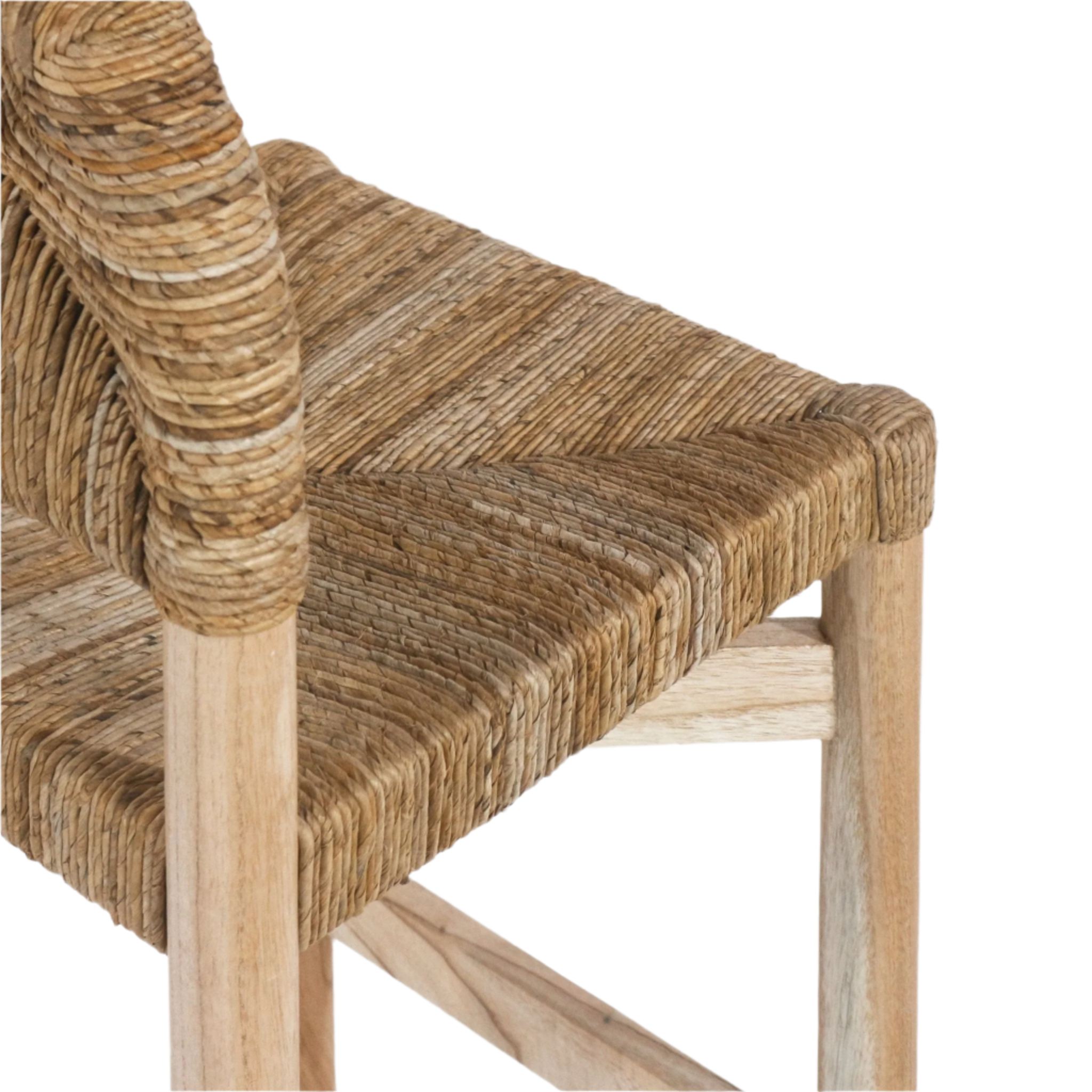 Close-up of a natural teak counter stool showing the tightly woven seagrass seat and wrapped seagrass backrest corner with light teak legs and footrest, highlighting the textured coastal finish.