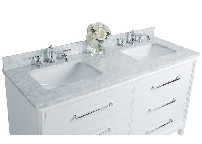 White wooden 60-inch bathroom vanity with a stone marble top, two rectangular undermount sinks, chrome faucets and long chrome drawer pulls, styled with a small glass vase of white flowers on the countertop.
